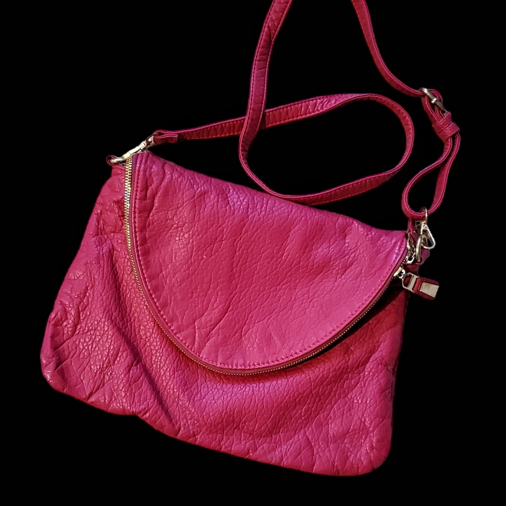 Hot Pink Leather bag.Fold over top zip. 10x13" size.